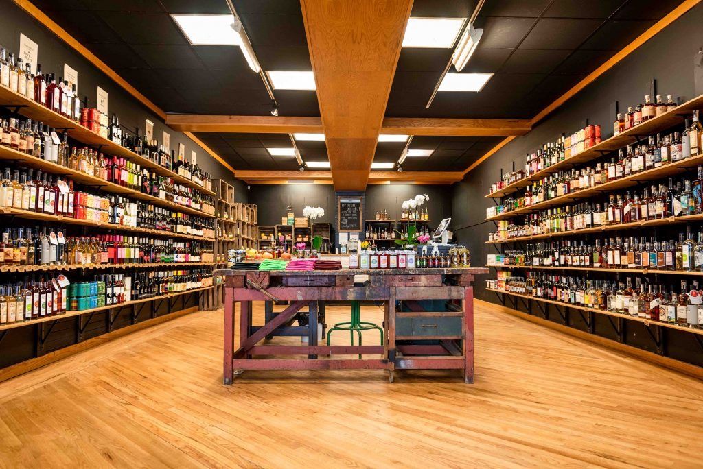 Inside Crown & Cask, shelves of wine and spirits